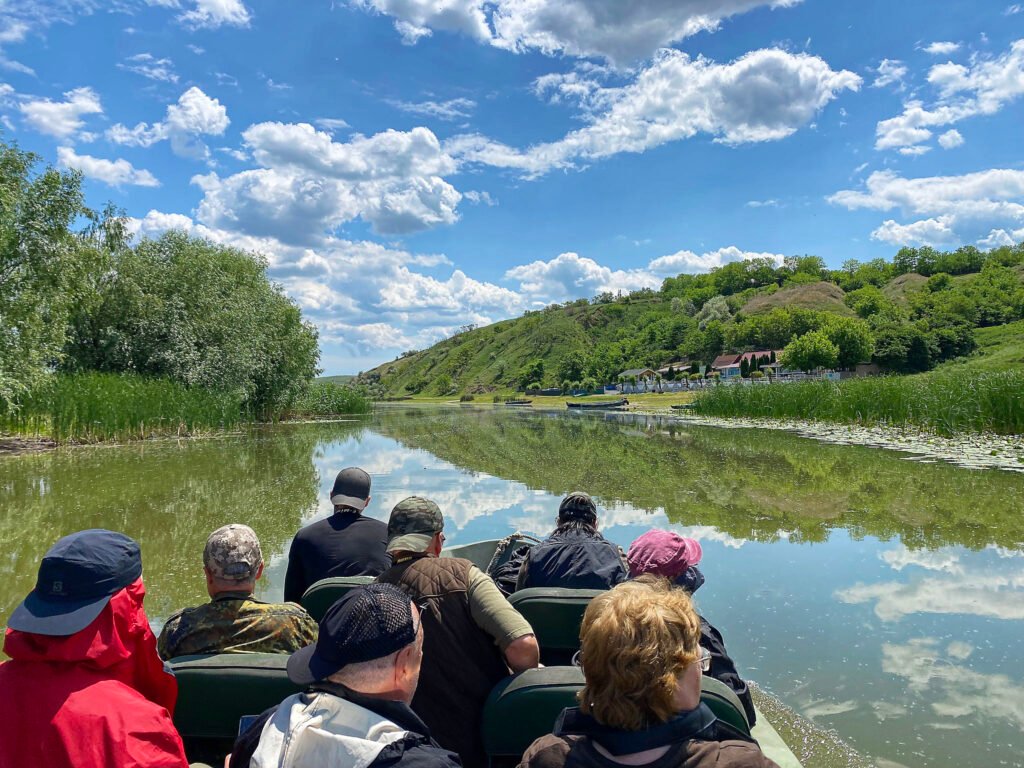 group boat tour on reflective channel romania