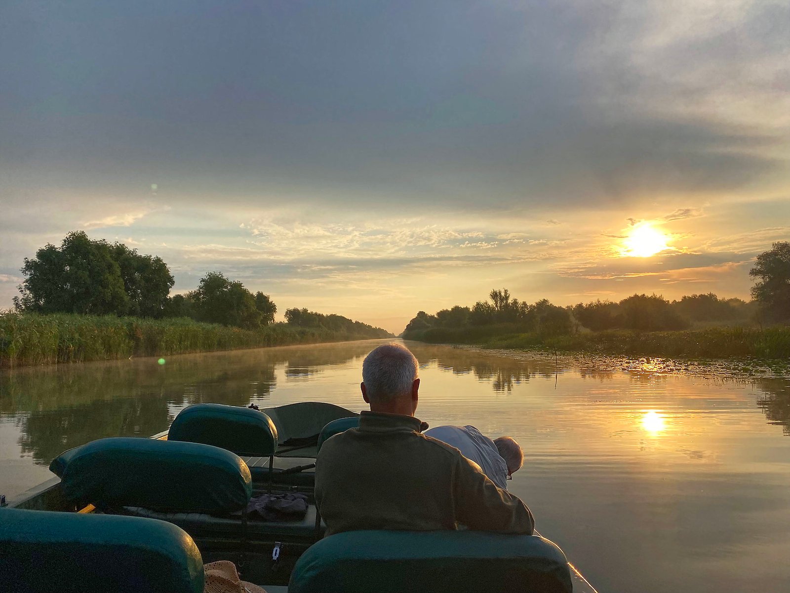 sunset boat trip on canal romania